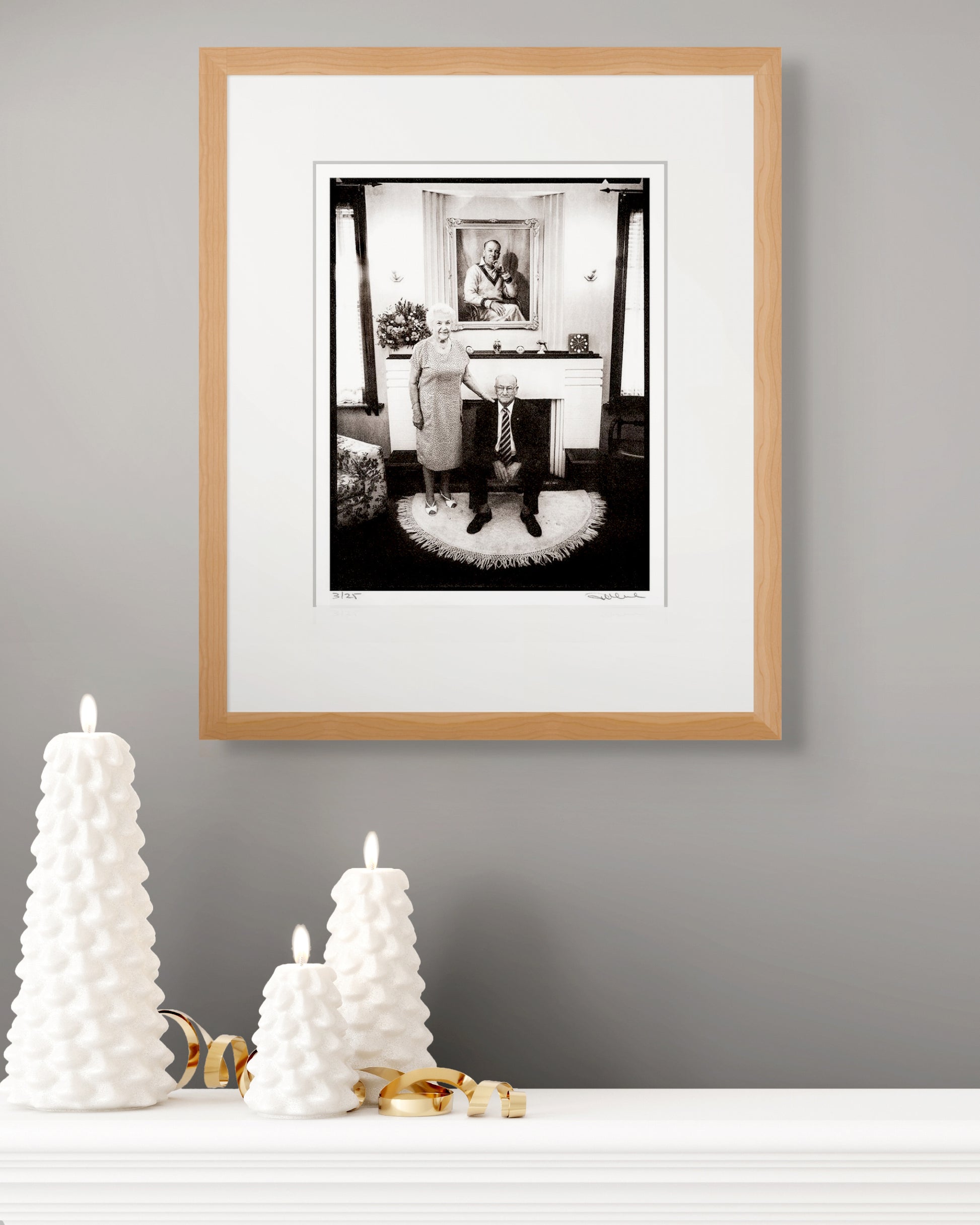 Framed limited edition Bradman portrait by Robin Sellick with white candles and gold ribbon – timeless collector’s gift celebrating an Australian icon.