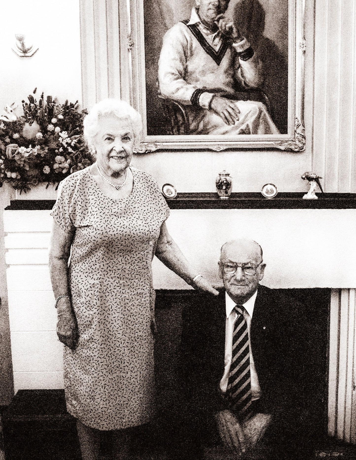 Detail close-up of the original black and white photographic portrait of Sir Donald and Lady Jessie Bradman by Robin Sellick, showing rich film grain and print texture.