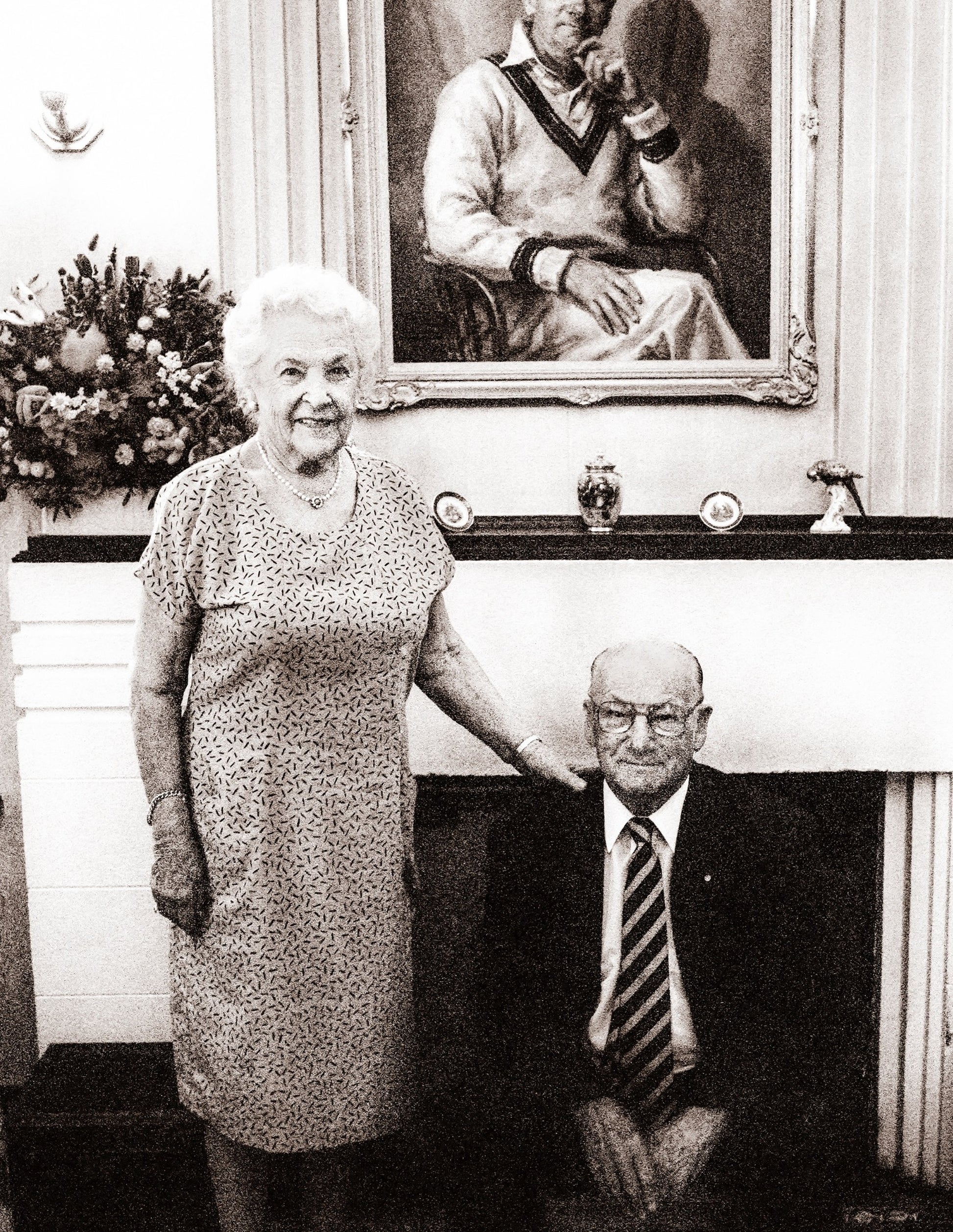 Detail close-up of the original black and white photographic portrait of Sir Donald and Lady Jessie Bradman by Robin Sellick, showing rich film grain and print texture.
