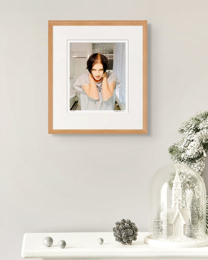 Framed limited edition Brian Molko portrait by Robin Sellick with soft winter styling – ideal collector’s gift from the Placebo era.
