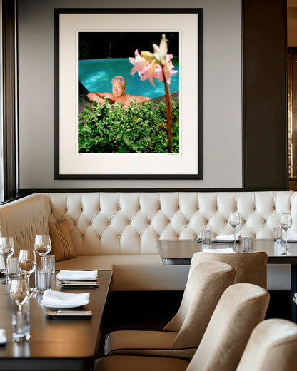 Framed colour photographic portrait of Don Dunstan photographed in Norwood, Adelaide in 1993 by Robin Sellick, displayed in a contemporary restaurant interior.