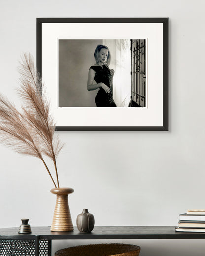 Black and white portrait of Kylie Minogue by Robin Sellick, captured in soft natural light – an intimate and tactile moment from the Collector Edition series.