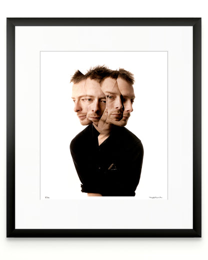 Framed photographic portrait of Thom Yorke by Robin Sellick, part of the Collector Edition series – a minimalist fine art print presented in a black frame with white mat.